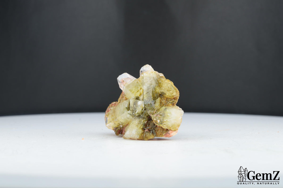 Quartz maclé et épidote sur baryte – Bou Azzer, Maroc – 16 g