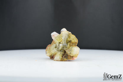 Quartz maclé et épidote sur baryte – Bou Azzer, Maroc – 16 g