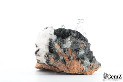 Cristaux de roche sur Hématite lamellaire (Spécularite) – Mine de Florence, Egremont, Royaume-Uni